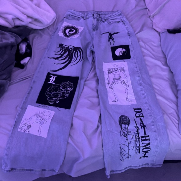 This pair of jeans with a anime called “Death note” on them. - Picture 1 of 1
